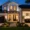 Best home improvements for ROI with modern curb appeal, garage door upgrade, landscaping, and refreshed kitchen